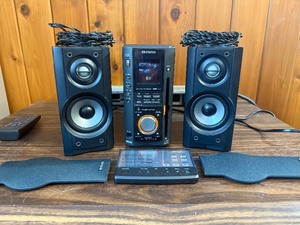 Vintage Aiwa XR-MS3 micro stereo system, including the main unit, remote control, and speakers