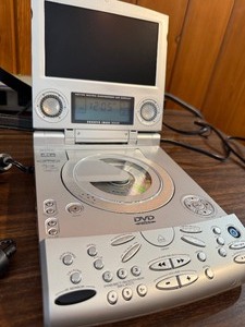 This item is a Sharper Image Portable DVDSound Soother (Model SI655)