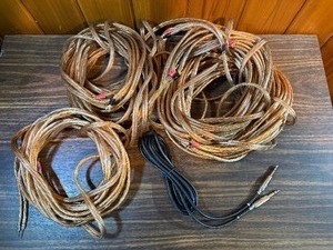various lengths of clear-jacketed speaker wire