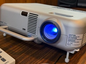 Near perfect condition NEC VT660, a portable 3LCD multimedia projector powers on , illuminates