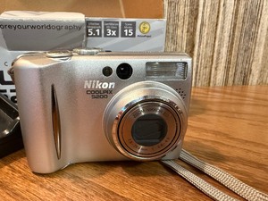 Silver Nikon Coolpix 5200 digital camera, untested