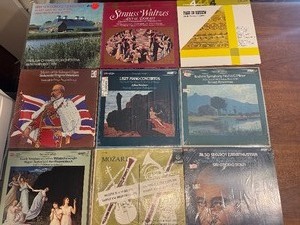 English -9 classical music vinyl LP records. These albums include recordings of composers such as Mozart, Brahms, and Strauss. This lot is listed in Near Mint to Mint condition.