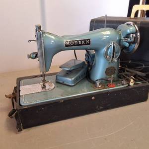 (Vintage) �Modern Sewing Machine� Includes foot pedal � plugged in and works