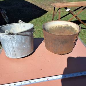 Two pots suitable for a hanging plant (holes on bottom or cracked)