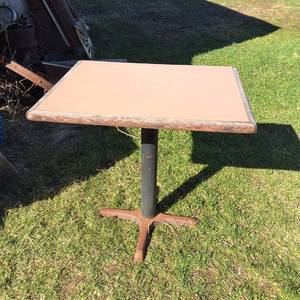 Nice Wooden table with metal stand 30 x 24 inch top, 29 inches tall