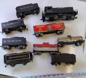 Vintage Tin Railroad Cars (O gauge) including Locomotive Engine and cars to caboose