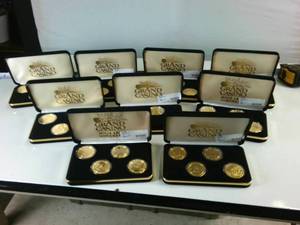 Mega Lot of Grand Casino Coins  (9) total cases, 36 coins total
