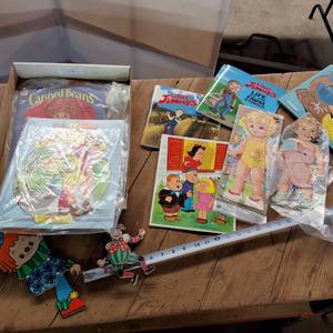 Large collection of kids puzzles, pull string dolls, and Little Jimmys Magazines