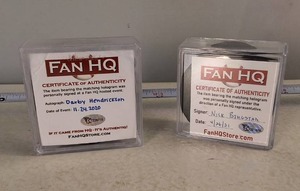 Two Autographed Hockey Pucks � 2020 Darby Hendrickson & Nick Bingstad