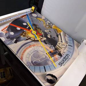 Swatch Poster and a Watch