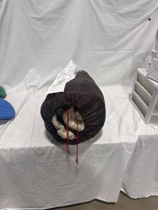 Brown Rolled Sleeping Bag