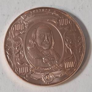 1 AVDP Oz. Copper Bullion Round designed to look like a US $100 banknote featuring Benjamin Franklin. Material 99.9% pure solid copper -BU