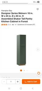 Forest green pantry cabinet and wall cabinet