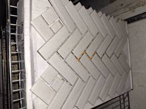 Parchment herringbone mosaic tile