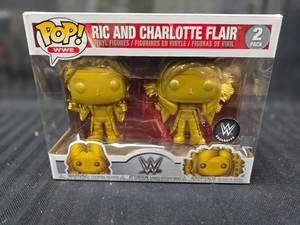 Pop Ric and Charlette Flair