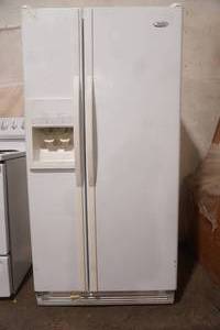 Whirlpool side-by-side refrigerator. w/water & ice dispenser
