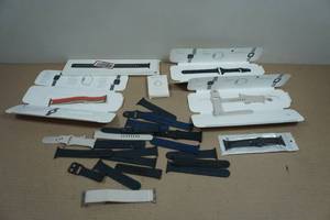 Asssortment of Apple Watch Bands and Charger