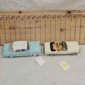 124 1966 Mustang and 1953 Ford Crown Victoria