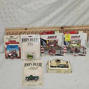 Six Small Die Cast Trucks