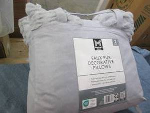 2 Faux fur decorative pillows...