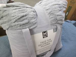 2 Faux fur decorative pillows...