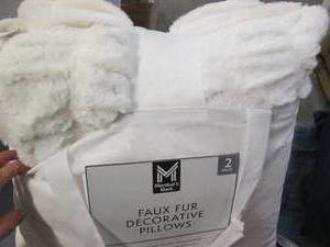 2 Faux fur decorative pillows...