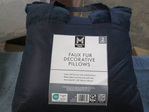 2 Faux fur decorative pillows...