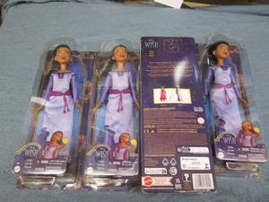 4 Disney Asha de Rosa dolls...