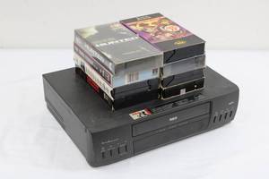 RCA VHS Player - 8 VHS Tapes Included NOT TESTED