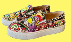 Christian Louboutin Graffiti-Print Studded Slip-On Sneakers - Made in Italy