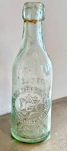 K - Antique Glass Glueks Beer Bottle - Minneapolis MN Embossed Star Seal - 7.5 in Tall, Clear Aqua