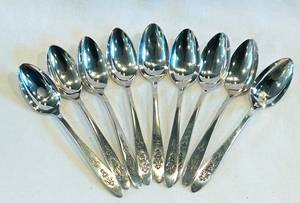 K - (9) 5-Inch Silver-Plated Spoons with Ornate Handles