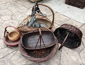 G - Seven Woven Baskets - Assorted Rattan and Wicker With Metal Leaf Accent Handle