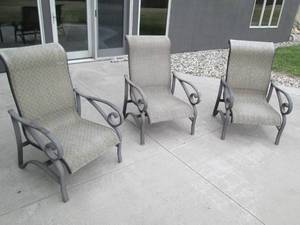 3 Rocking metal frame patio chairs...