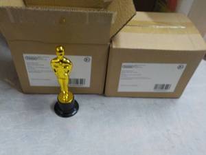 24 Plastic Trophies...