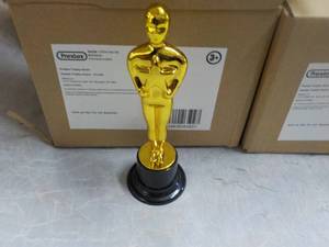 24 Plastic Trophies...