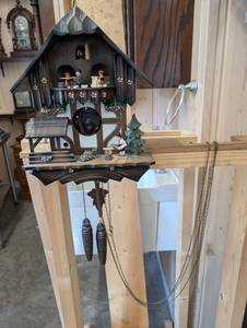 Black Forest Chalet Cuckoo Clock with Moving Balcony Figures & Pinecone Weights