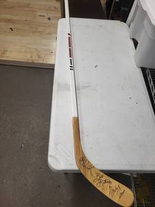 Wisconsin Badgers Signed Hockey Stick - Signed by Bill Buters and 1980s Miracle Olympian and Womens Head Coach Mark Johnson