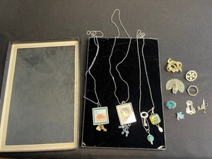 Vintage Stamp Pendant Necklaces & Rhinestone Brooches in Display Case - brooches missing stones or pins