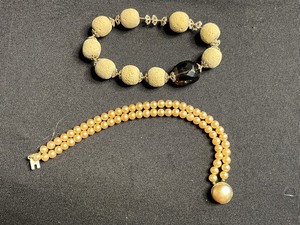Double-Strand Pearl Bead Bracelet (unauthenticated) & Cream Textured Bead Stretch Bracelet with Black Faceted Accent