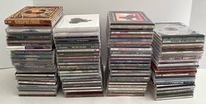 CDs Collection - Rock, Pop, Jazz & Soundtracks in Jewel Case Stacks