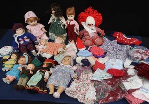 PLASTIC ROLLING 3 DRAWER SHELF FULL OFVINTAGE  DOLLS AND DOLL  CLOTHES