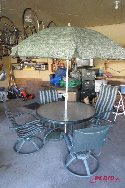 lot 60 image: Glass Patio Table, 4 Chairs and Umbrella