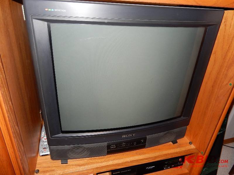 lot 10A image: Light Oak Entertainment Center. TV Included