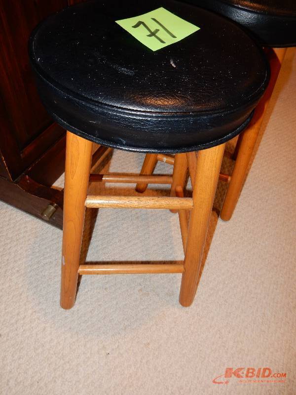 lot 71 image: 2 Bar stools.. Wood and naugahyde seat
