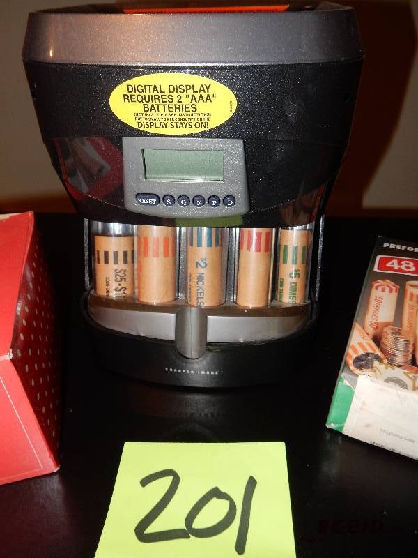 lot 201 image: Sharper Image Coin Roller