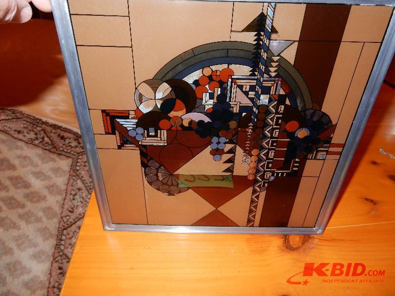 lot 227 image: Frank Lloyd Wright Stained glass piece.  12in x 12 in.