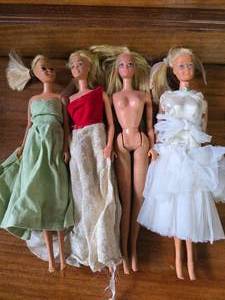 FOUR Vintage Barbies. One is 1966.