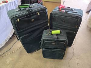 Set of Black Luggage with Wheels and Handles