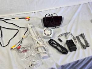 Various Electronics and Accessories Including Intermatic Timer, RCA Cables, and Battery Charger